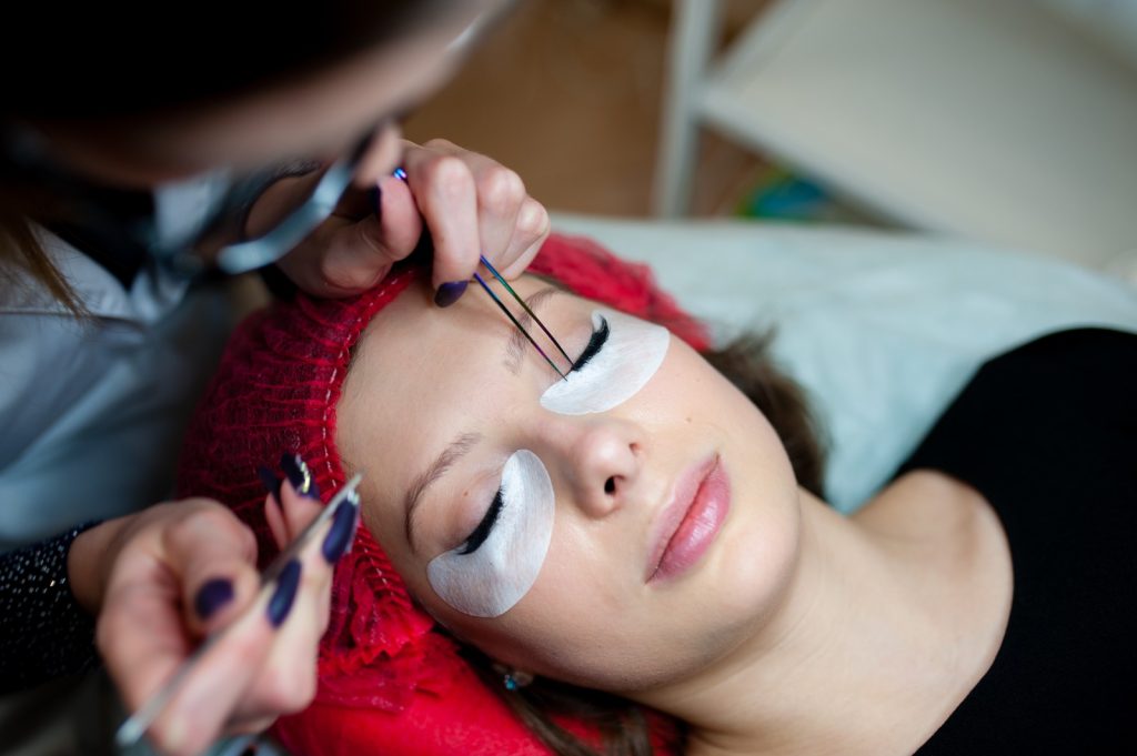 eyelash extension applying in salon